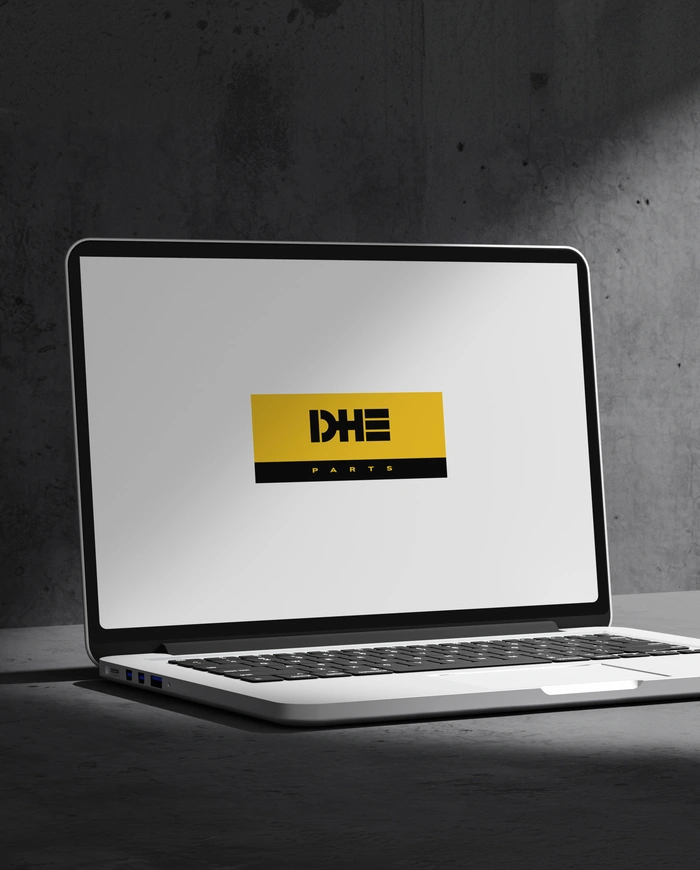 DHE Parts logo on a laptop screen