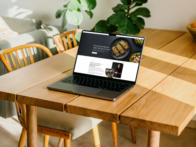 VJ Cuisine website shown on a laptop