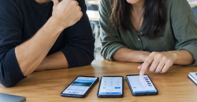 Founder and product manager reviewing mobile app prototypes on smartphones